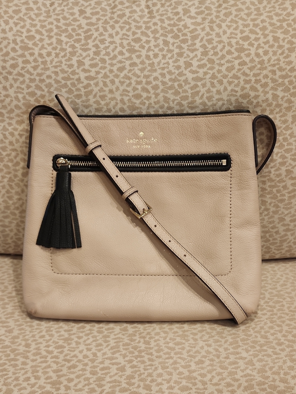 Kate Spade Chester Street Dessi Beige Leather Crossbody with Black Tassel Accent